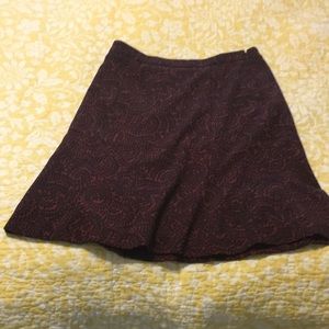 Beautiful lined side zip skirt. Never been worn.